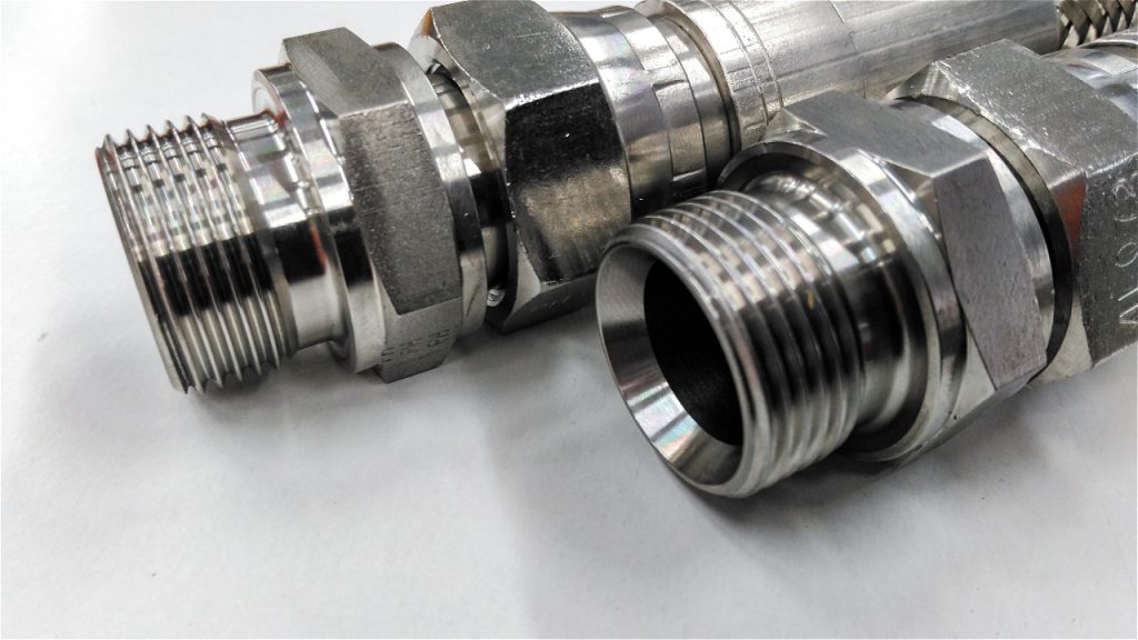 Metal piping connectors close-up